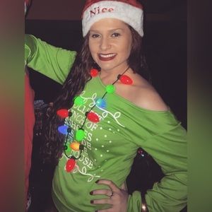 Green one shoulder holiday sweater